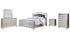 Coralayne King Panel Bed with Mirrored Dresser, Chest and Nightstand